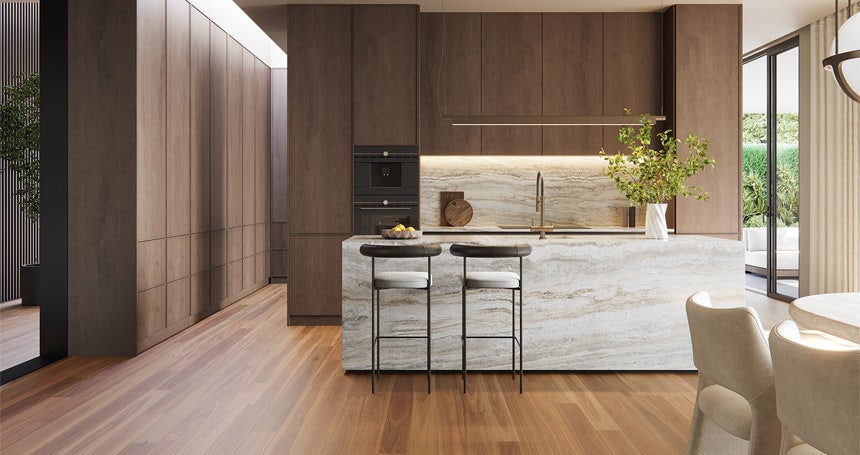 Modern kitchen design featuring beautiful Australis Spotted Gum engineered timber flooring. Warm, natural wood tones complement the island and cabinetry.