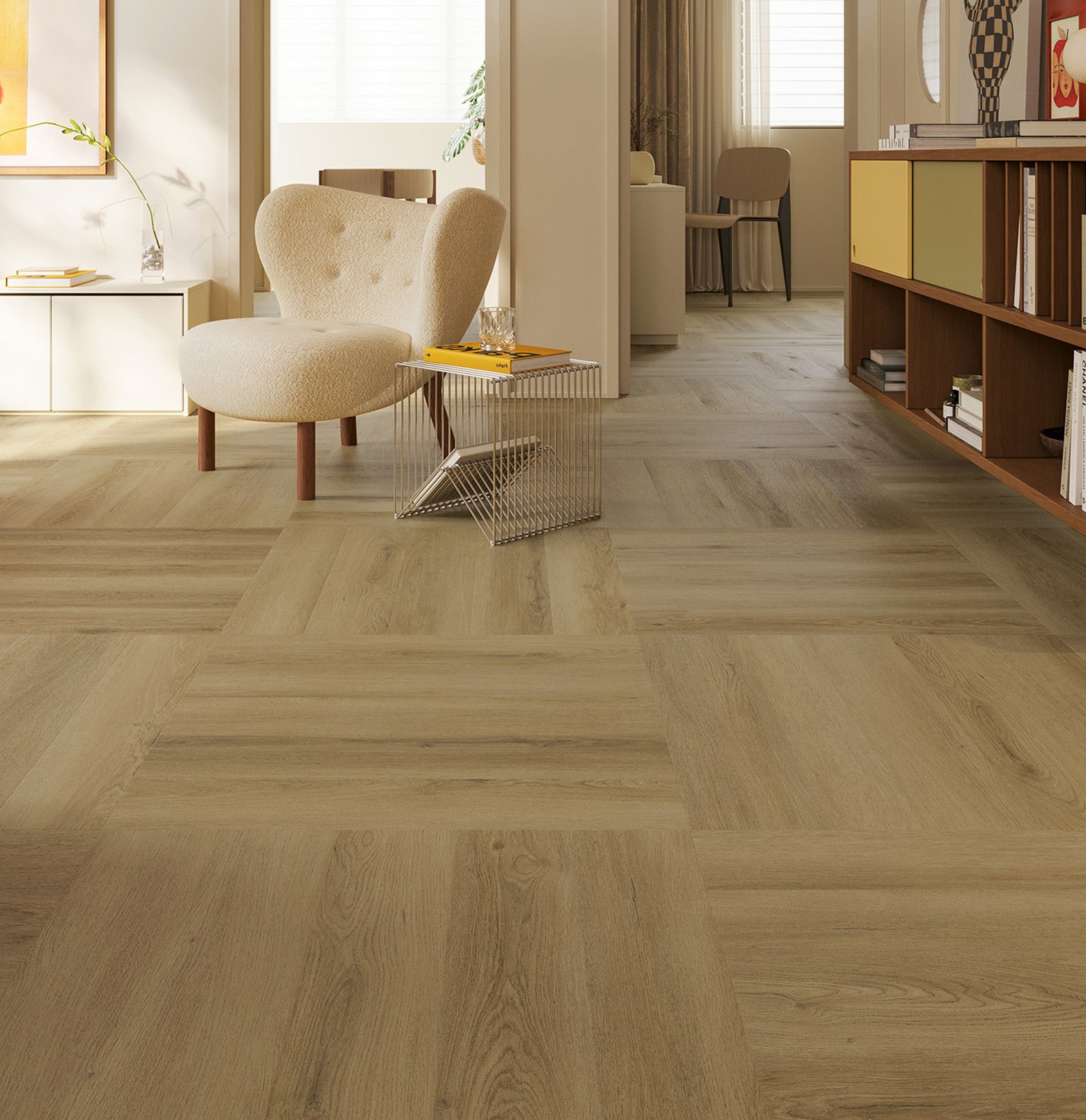 Living room featuring Charm Natural Oak Herringbone hybrid flooring with textured finish, complemented by modern furniture and neutral decor.