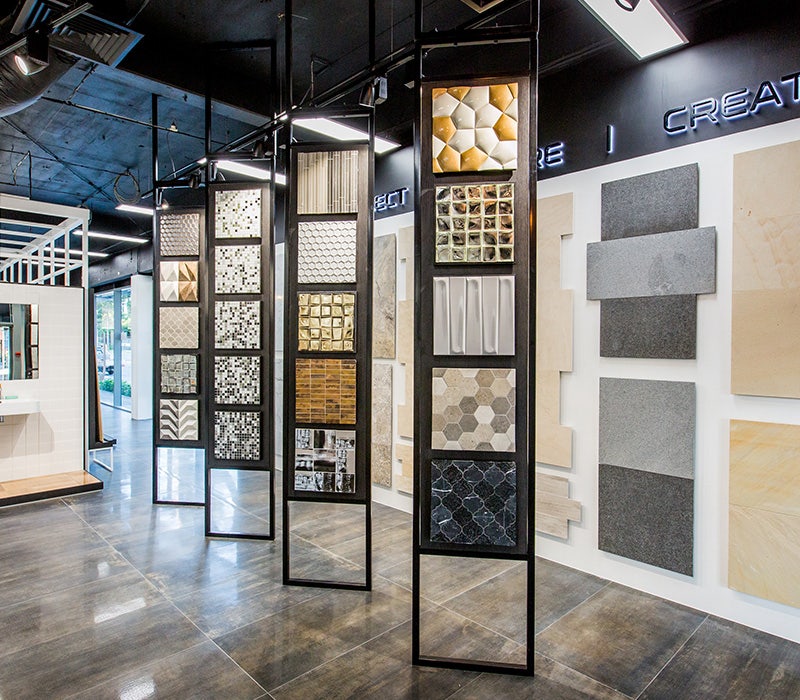 Beaumont Tiles store inside, wooden look glossy floor tiles, tiles and mosaics on display