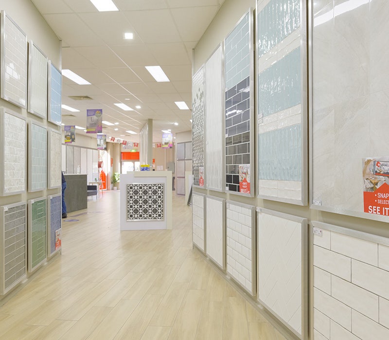 Beaumont Tiles Sydney store inside, wooden look floor tiles, different tiles on display 