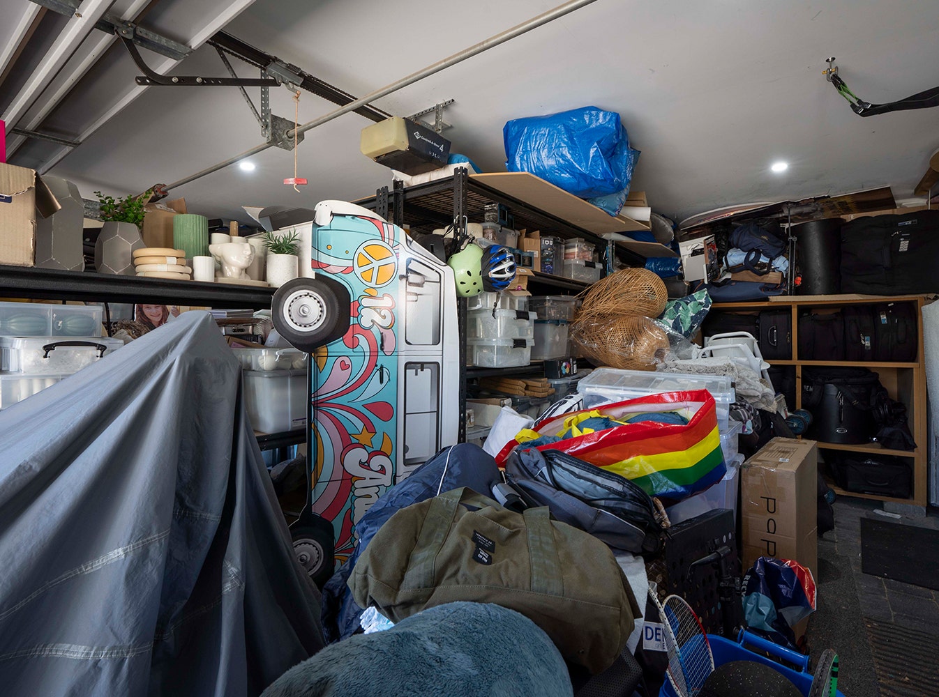 before photo of the garage full with clutter up to the roof