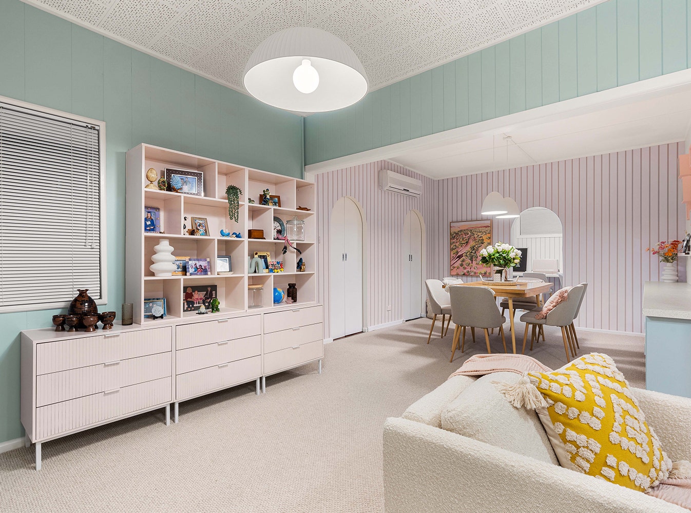 a renovated pastel coloured bright living room in Sandra's house