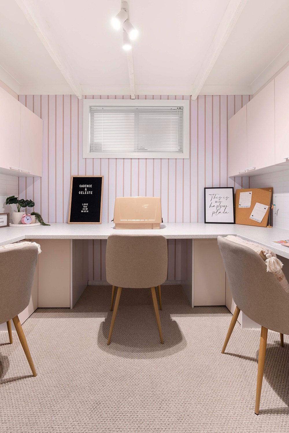 A pastel pink modern carpeted bright sewing room promoting episode 4 of the space invaders tv show 